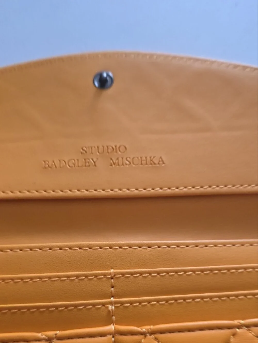 Quilted Yellow Wallet Clutch with Round Metal Emblem